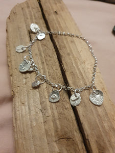 Bracelet- unique molten charm bracelet