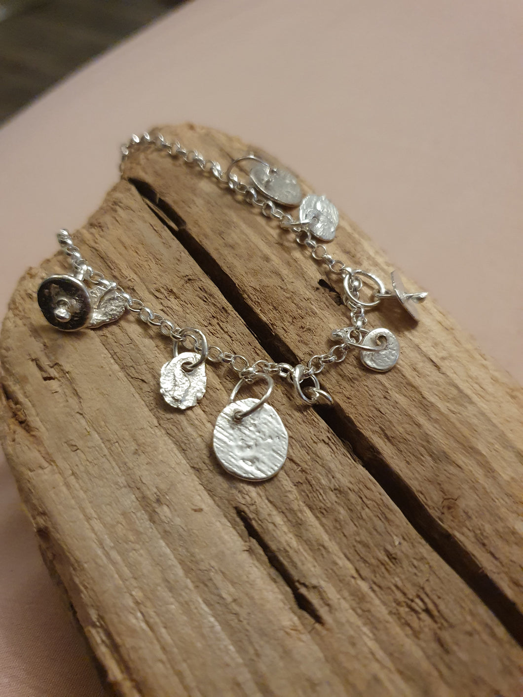 Bracelet- unique molten charm bracelet