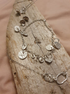 Bracelet- unique molten charm bracelet