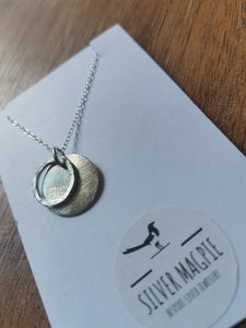 Necklace - Small Hammered Hollow Circle with a brushed silver disc